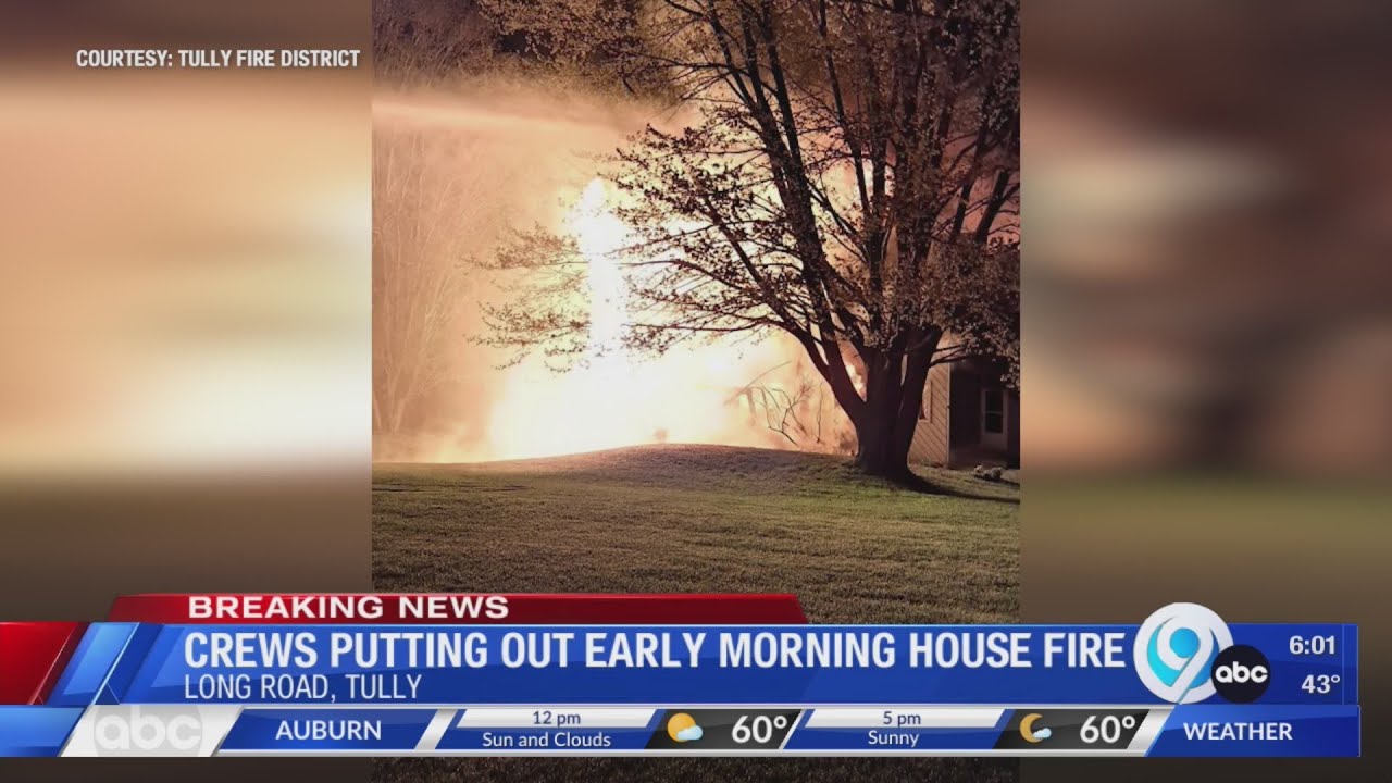 Crews putting out early morning house fire in Tully - YouTube