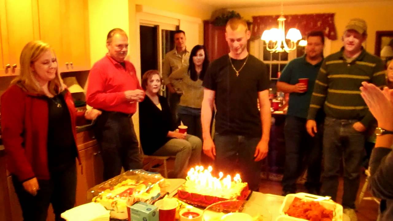 Blowing out candles. part 2 of Surprise Birthday Party