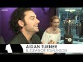 Poldarks aidan turner and eleanor tomlinson on the bbc radio1 breakfast show with nick grimshaw