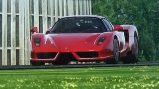 The stig driving a blistering lap around top gear test track.