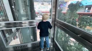 Riding the elevator at the mall ￼