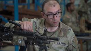 Soldiers with 1st Brigade Combat Team, 10th Mountain Division, Install MILES Gear at JRTC