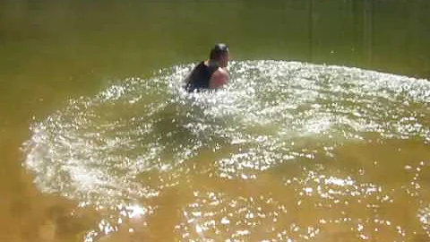 Ronnie McCoy dives into the Colorado River in the ...