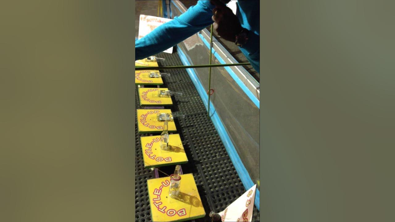 CARNIVAL GAMES bottle up game..boo bottles teaches you how!! YouTube