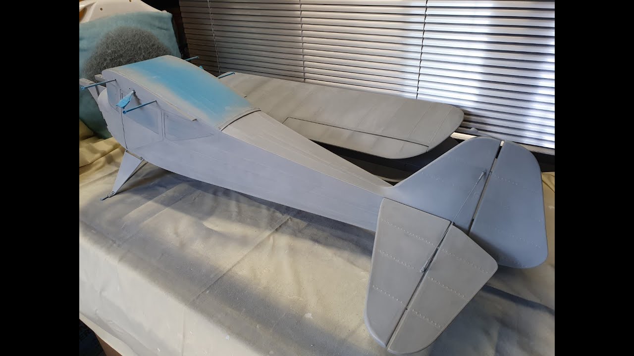 Spraying Primer and Klass Kote silver epoxy paint