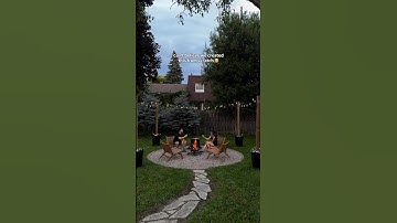 Pt 3 of our backyard fire pit area: string light poles using planters! #diyhomeimprovement #firepit