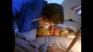 Baby Einstein Stock Footage - Mother tucking her daughter in bed Baby Einstein Stock Footage - Mother tucking her daughter in bed