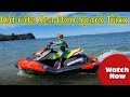 Kids riding jet ski sea doo spark trixx