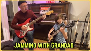 Learning Riders in the Sky with grandad/Cool kid on guitar age 9 Sound of Silence/Practicing riffs.