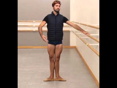 Demi plié in first position. Basic steps of ballet class. By Ruben Martin. Dancer, Diego Cruz.