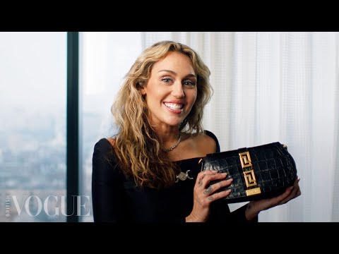 Inside Miley Cyrus’s Versace Handbag | In The Bag