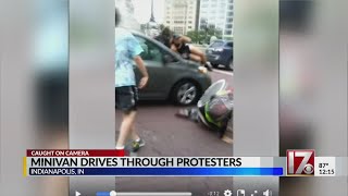 Minivan plows through protesters in Indianapolis