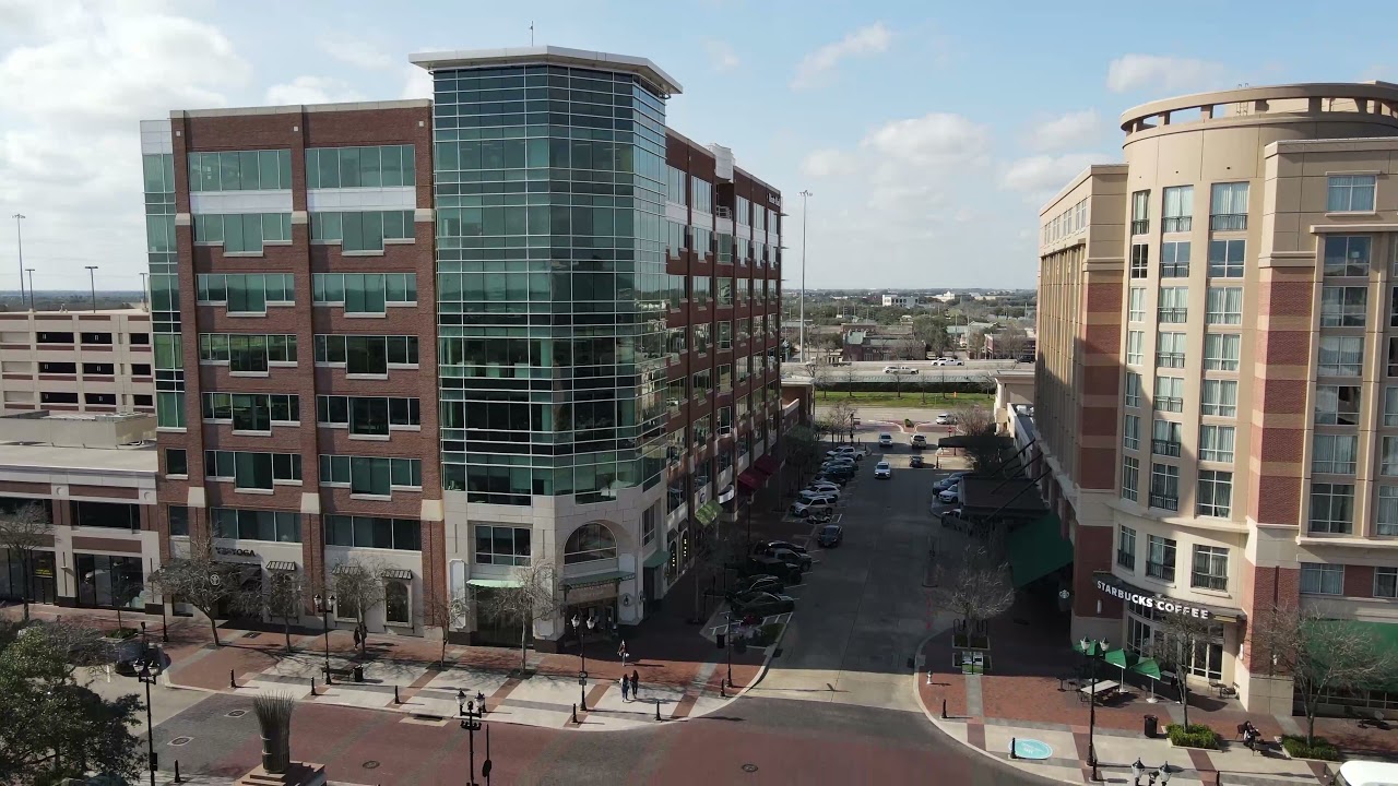 Sugar Land Town Square slow motion drone pan