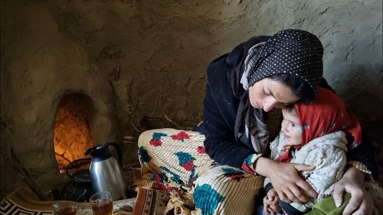 Collecting firewood and cooking mountain herbs by Zari, a nomadic woman ...