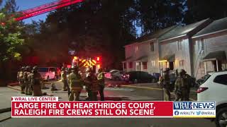 Fire crews battle large fire at an apartment building in Raleigh