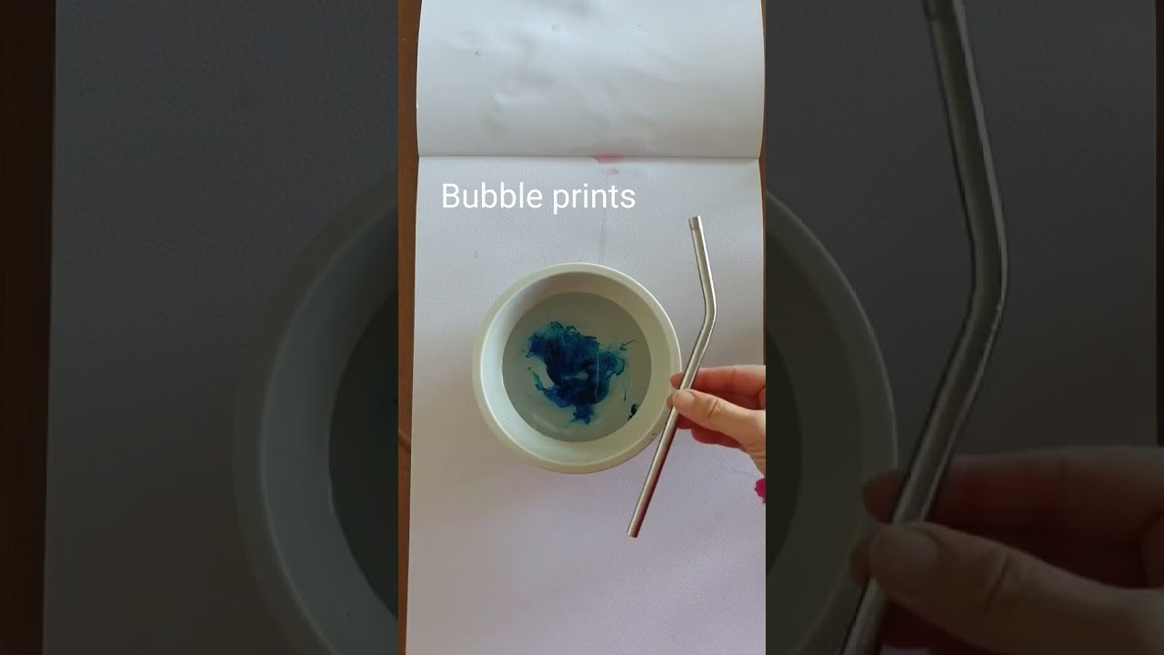 Bubble printing. Blow through a straw and print.  