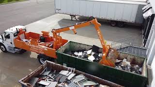 Trashpac open top dumpster compaction