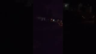 Shadow figure in window staring at us
