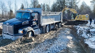 Recover of Brand New Dump Truck with CAT 320