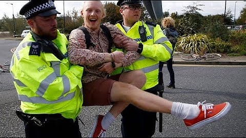 Climate activists cause chaos at London airport