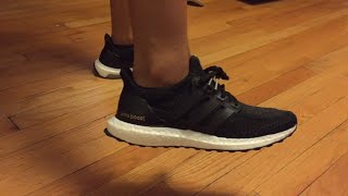 adidas ultra boost core black 2.0 on feet