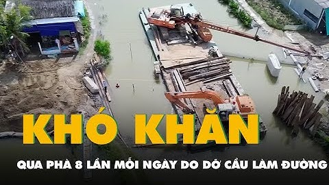 Dỡ cầu làm đường, nhưng đường mãi chưa xong, dân phải qua lại phà 8 lần mỗi ngày