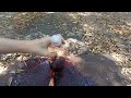 cutting open mystery flavoured bottle of water