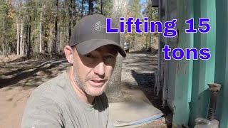 One man lifting and leveling a shipping container box system