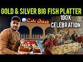 100k celebration  silver button  gold silver fish platter