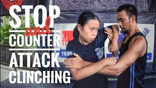 stop and counter attack clinching by elbow and push knee