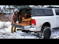 Truck camping with wood stove in winter