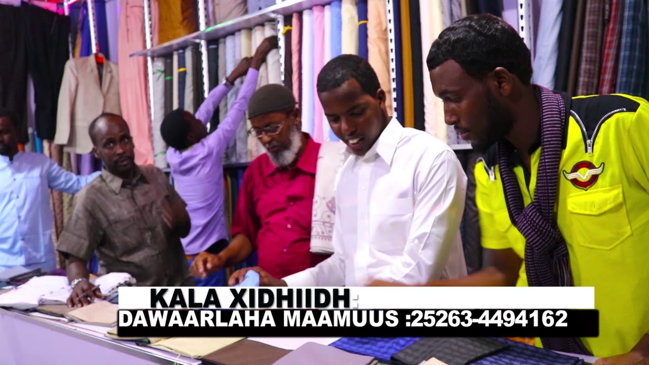 Dawaarlaha MAAMUUS oo kuu Hayada Dharka Sida Quruxda Badan Dalka Loogu Tolo camera iphone 8 plus apk