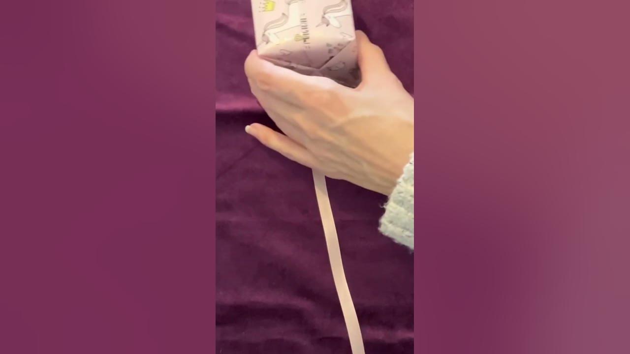 Claire’s ASMR gift wrapping 🌈 wrapping 1 candle in pink wrapping paper