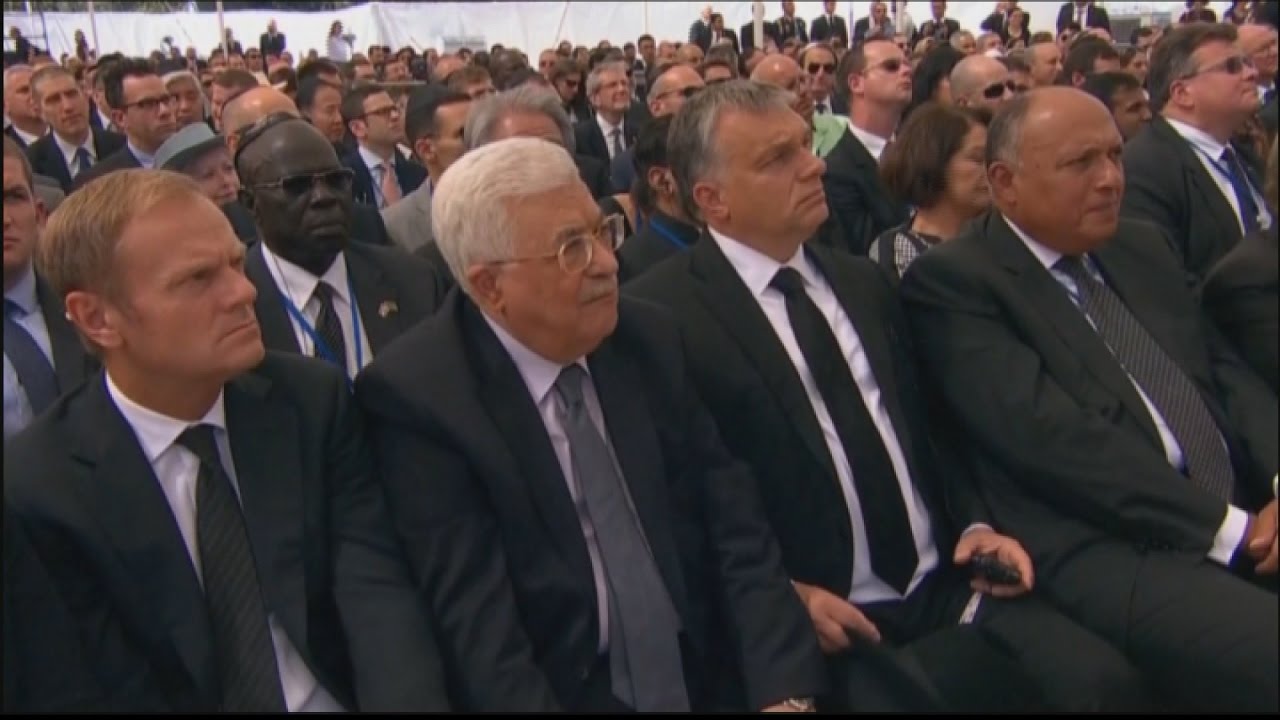 استمرار الغضب الفلسطيني على مشاركة عباس بتشييع بيريز