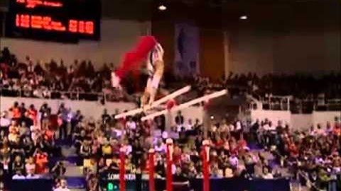 Parallel Bars Glide Kip through L Sit Press to Handstand on One Rail Gymnastics Video