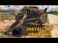 installing culvert pipe for driveway using CAT 259D skid steer