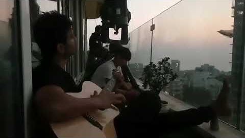 Sushant Singh Rajput playing guitar