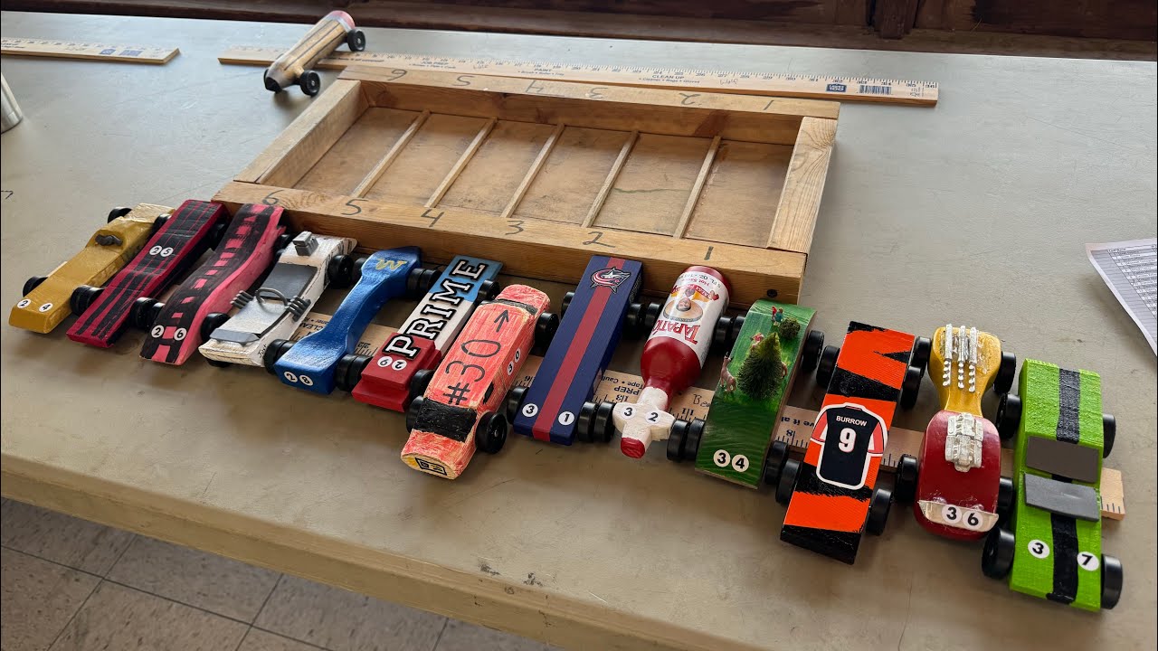 Pinewood derby car race! Brothers! Craft store! Power tools! Inflatable