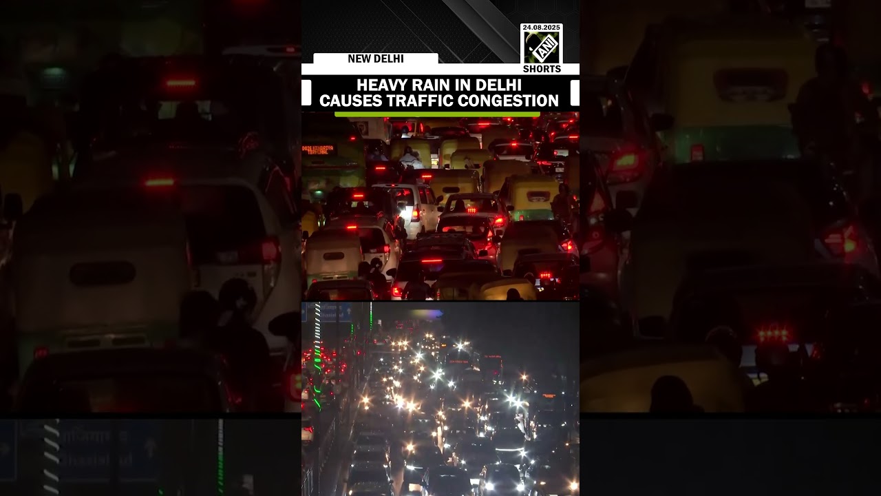 Heavy rain in Delhi causes traffic congestion and slow vehicle movement across city