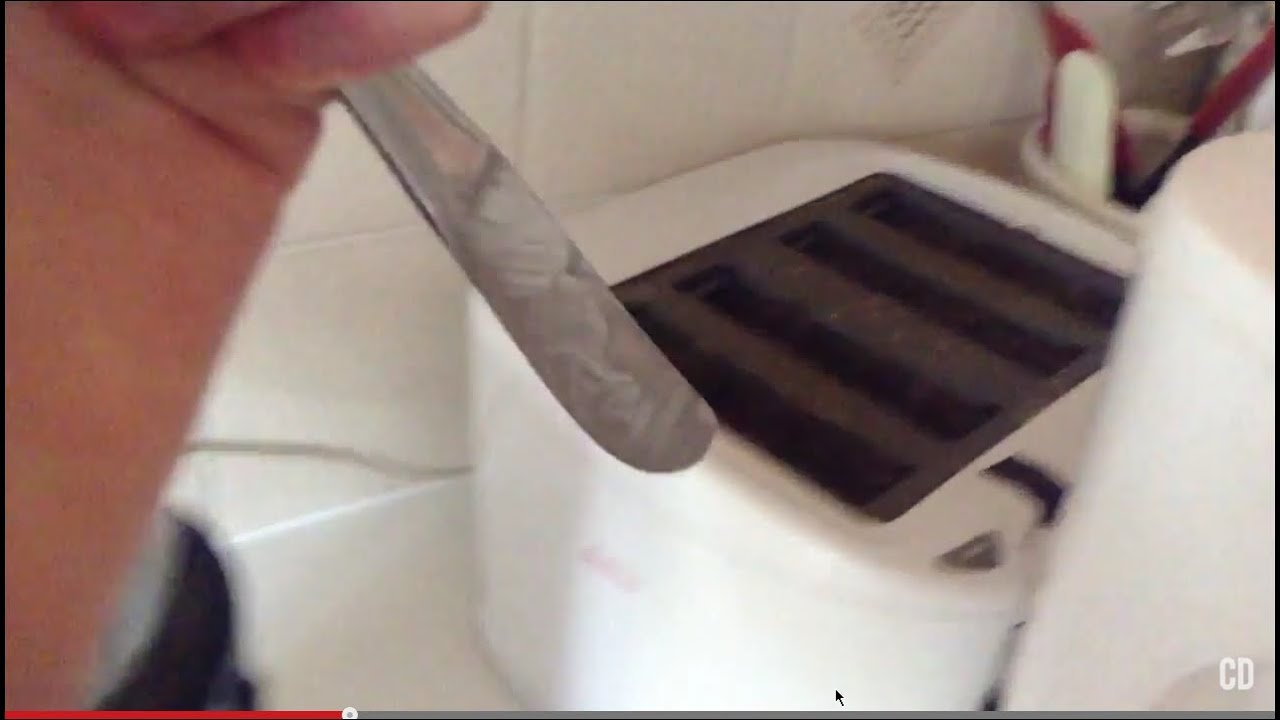 Sticking a metal knife in a toaster that's plugged in YouTube