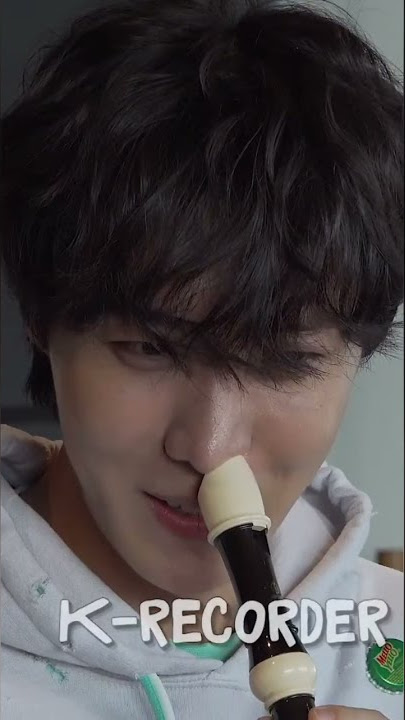Jhope playing the recorder with his nose