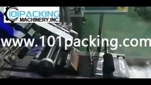 Automatic empty bag paging feeding top labeling machine testing video