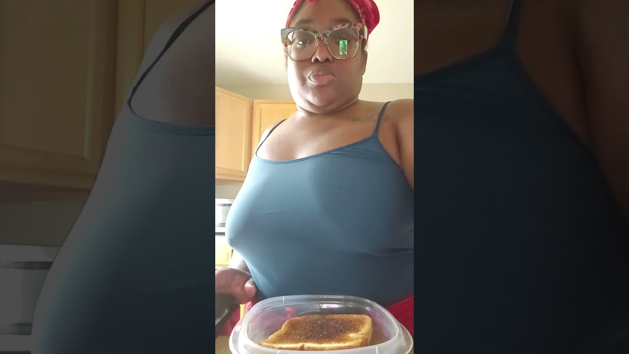 Omelette, jelly/butter toast, iced coffee, orange juice and water