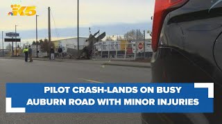 Pilot crash-lands on busy Auburn road, escapes with only minor injuries