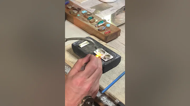Silversmithing + soldering demonstration in the st...