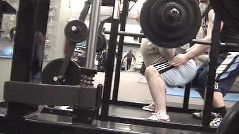470 pound raw squat (slightly above parallel?)