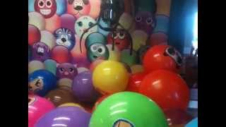 Playing A Ball Claw Machine.