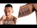 UFC Champion Max Holloway Breaks Down His Tattoos | GQ Sports