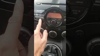 How to Adjust The Clock Mazda 2 2009 - 2014