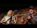 Carl jackson and ashley campbell singing a trio of songs on banjo and guitar